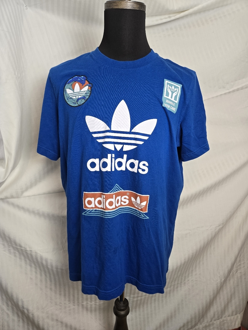 Adidas Blue Trefoil Logo Graphic Tee.  TM